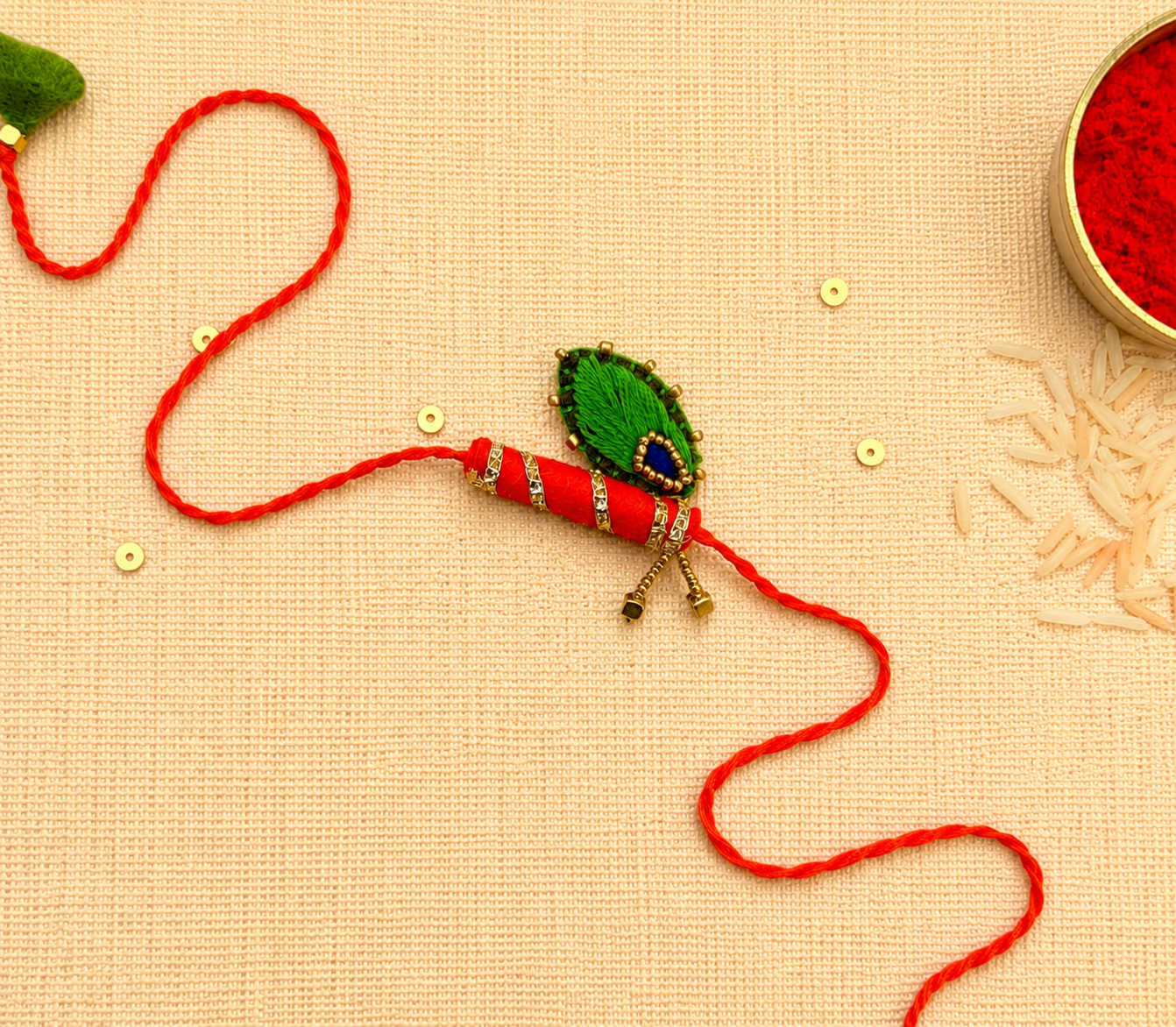Hand embroidered Bansuri Rakhi-Orange