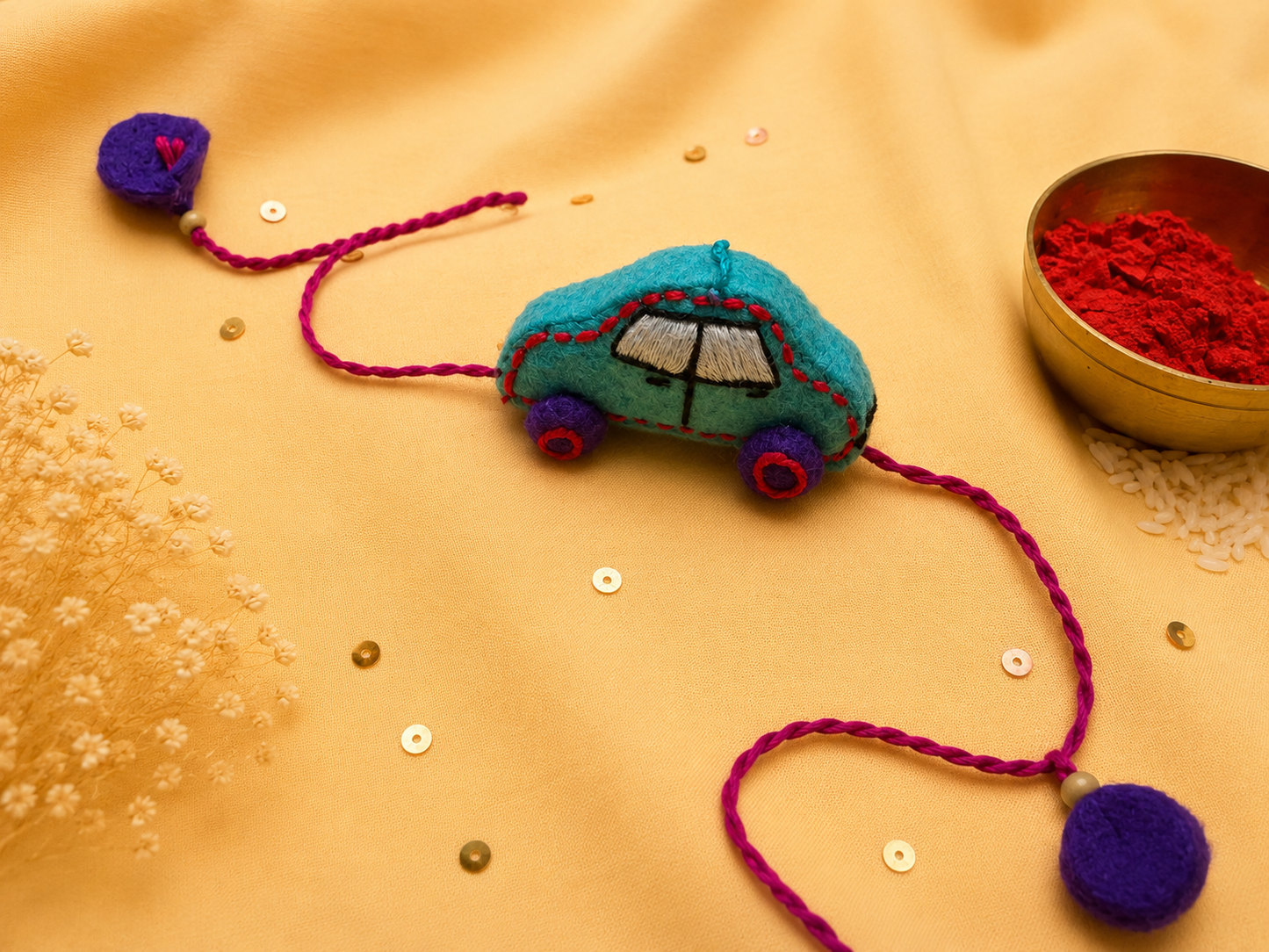 Hand embroidered Car Rakhi- Sea Green