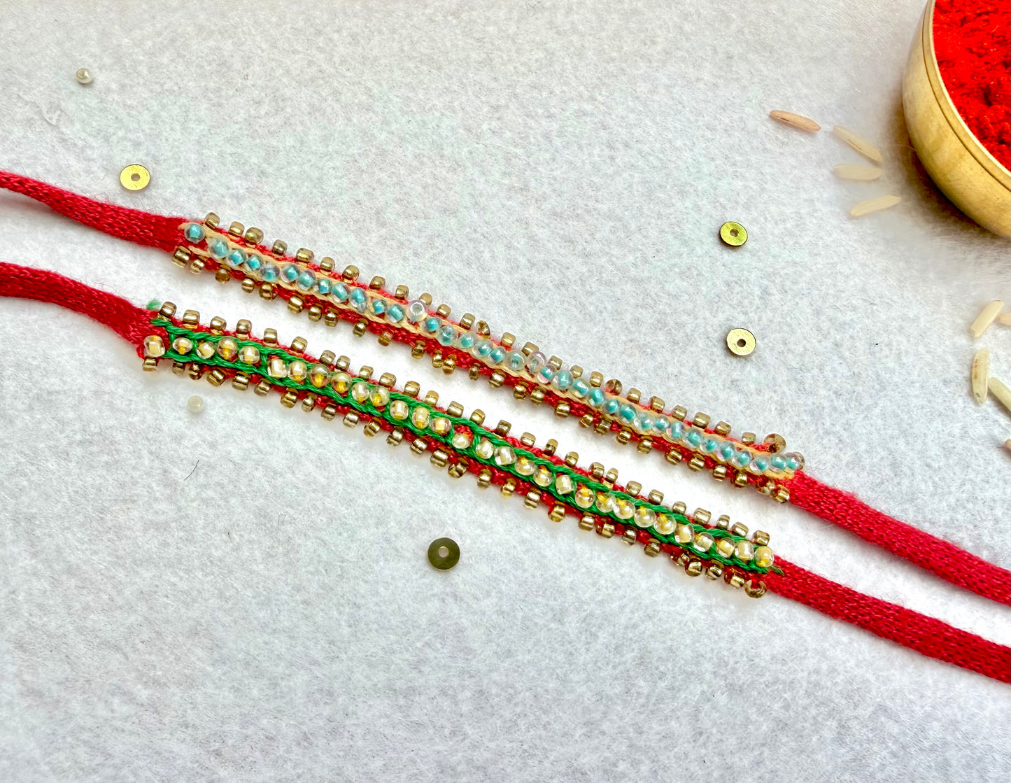 Hand embroidered Beaded Chain Rakhi (Set of 2)- Green-Beige