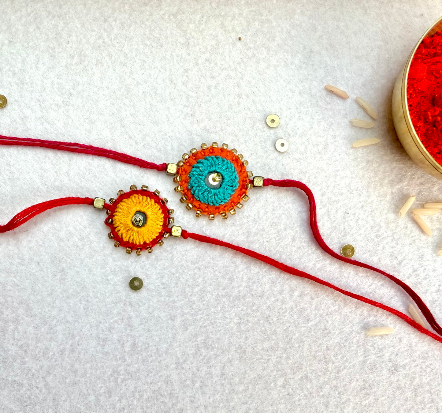 Hand embroidered Sheesha Rakhi (Set of 2) Yellow-Blue
