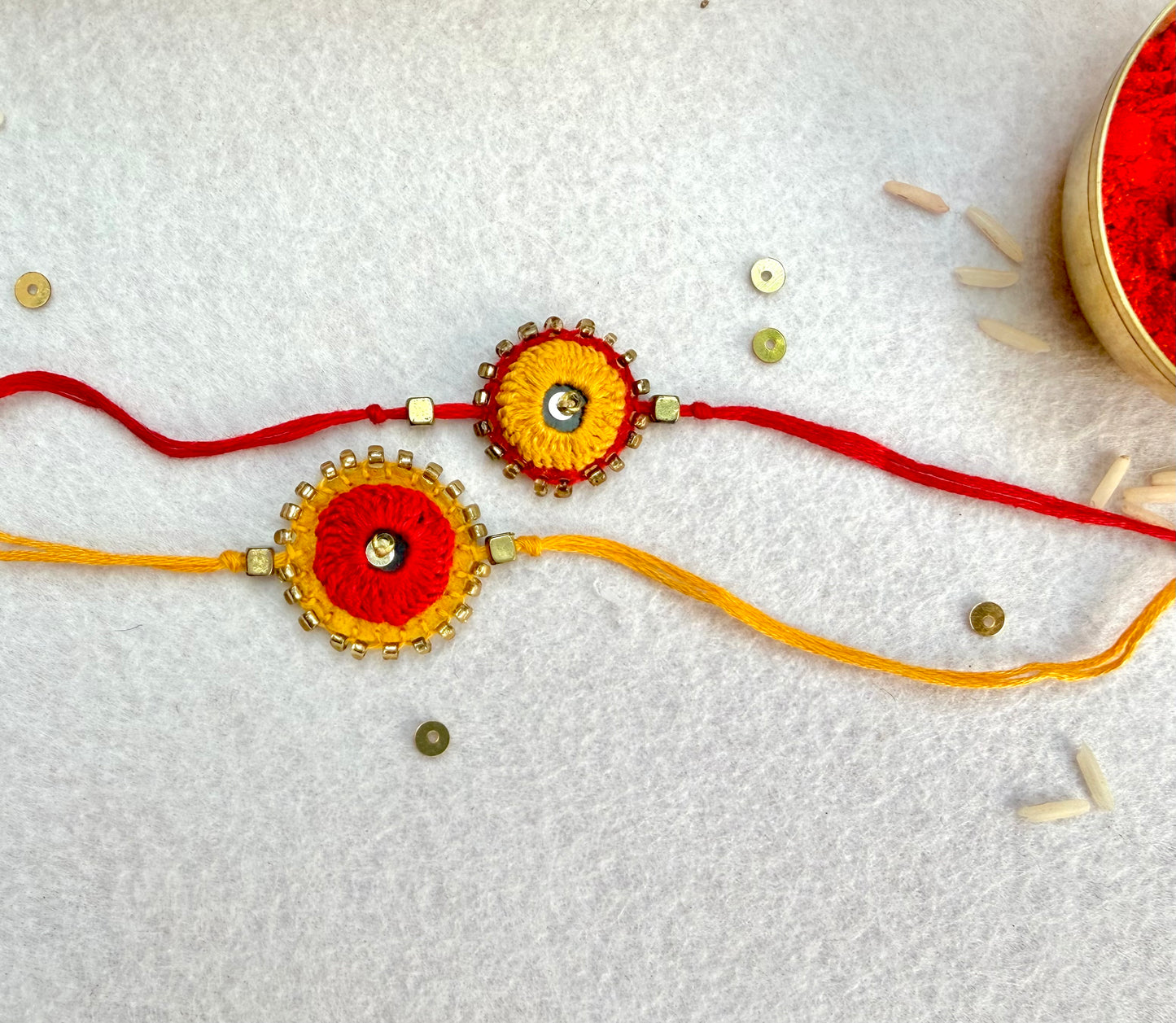 Hand embroidered Sheesha Rakhi (Set of 2) Red-Yellow