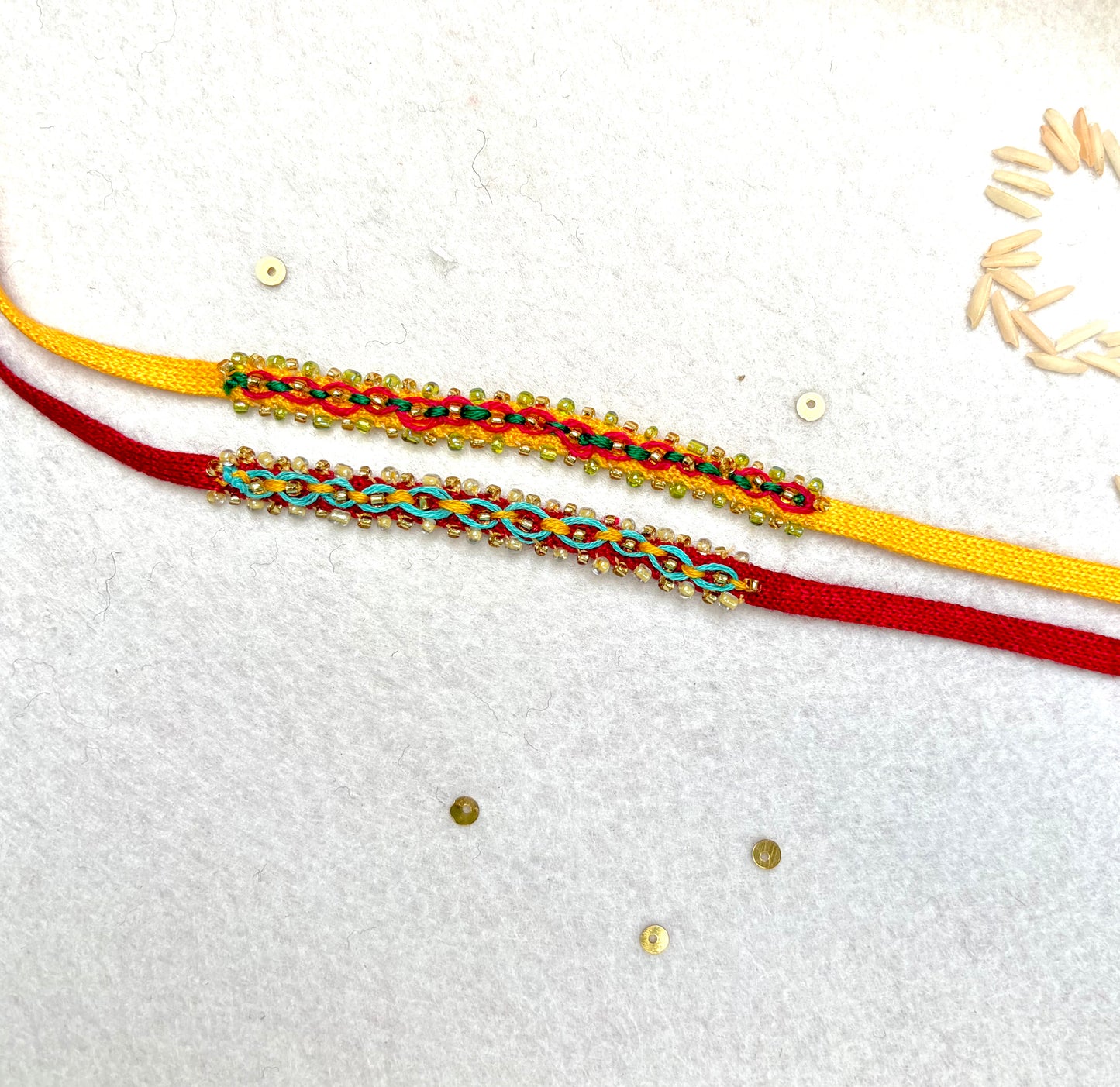 Hand embroidered Double Leheriya Rakhi (Set of 2)- Blue-Pink