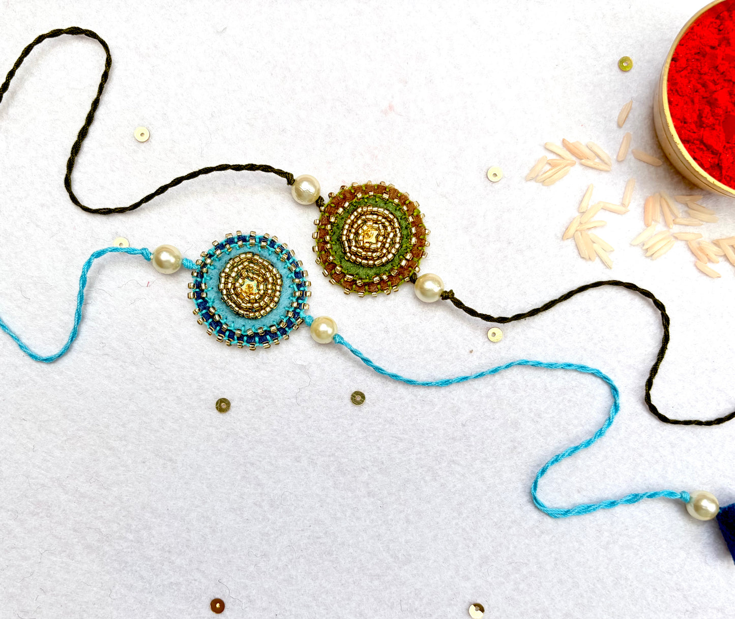 Hand embroidered Sitara Mandal Rakhi (Set of 2)- Blue-Green