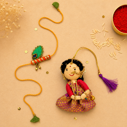 Radha Bansuri Rakhi Lumba Set (Set of 2)- Purple-Orange