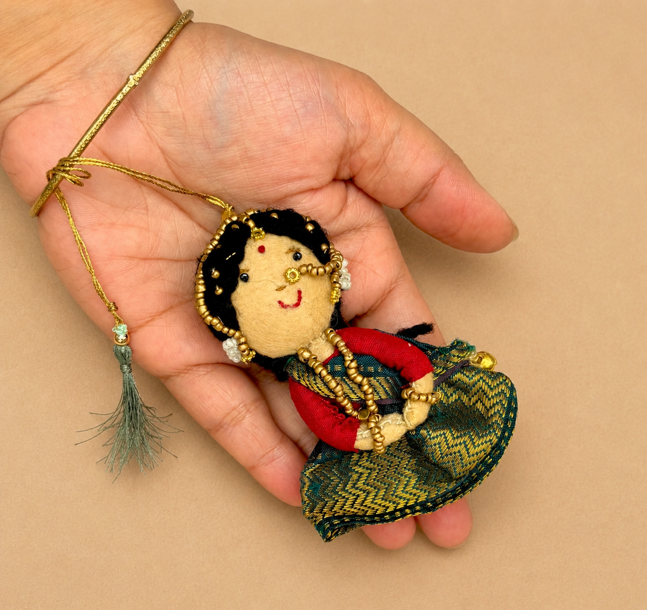 Radha Bansuri Rakhi Lumba Set (Set of 2)- Green-Orange