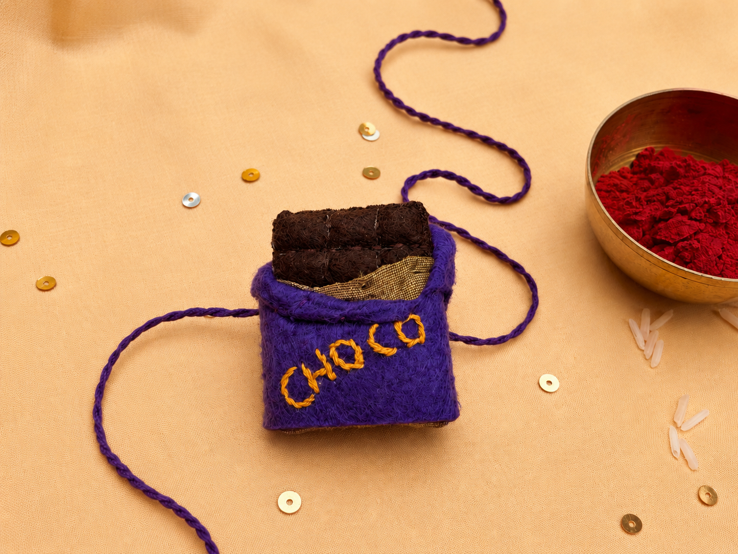 Hand embroidered Chocolate Rakhi- Purple
