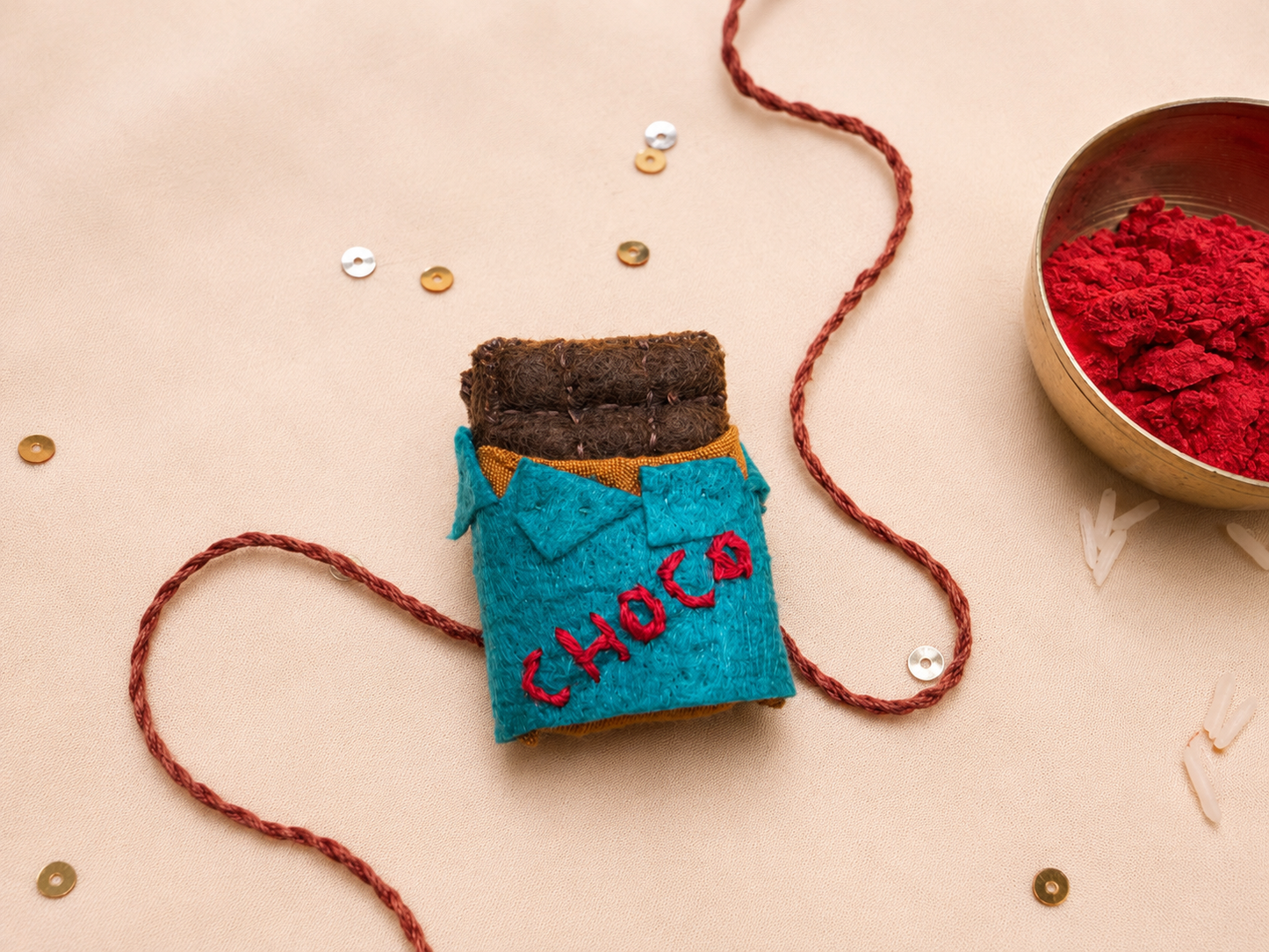 Hand embroidered Chocolate Rakhi- Sea Green