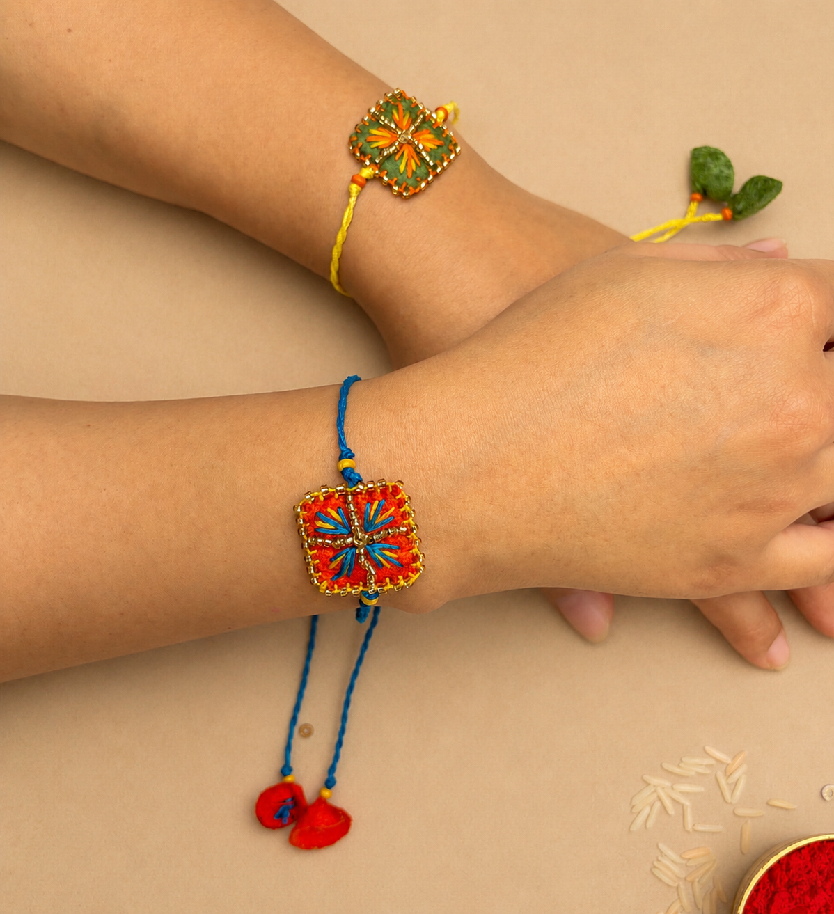 Hand embroidered Chowk Rakhi (Set of 2)- Green-Orange