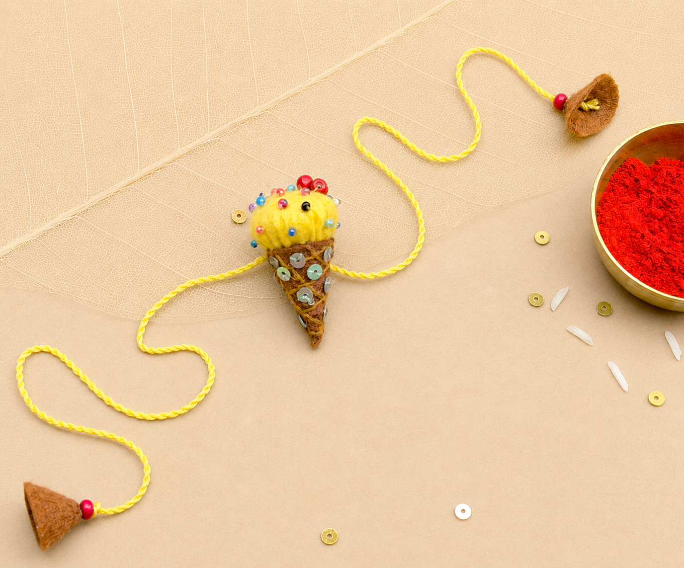 Hand embroidered Ice-Cream Rakhi-Yellow