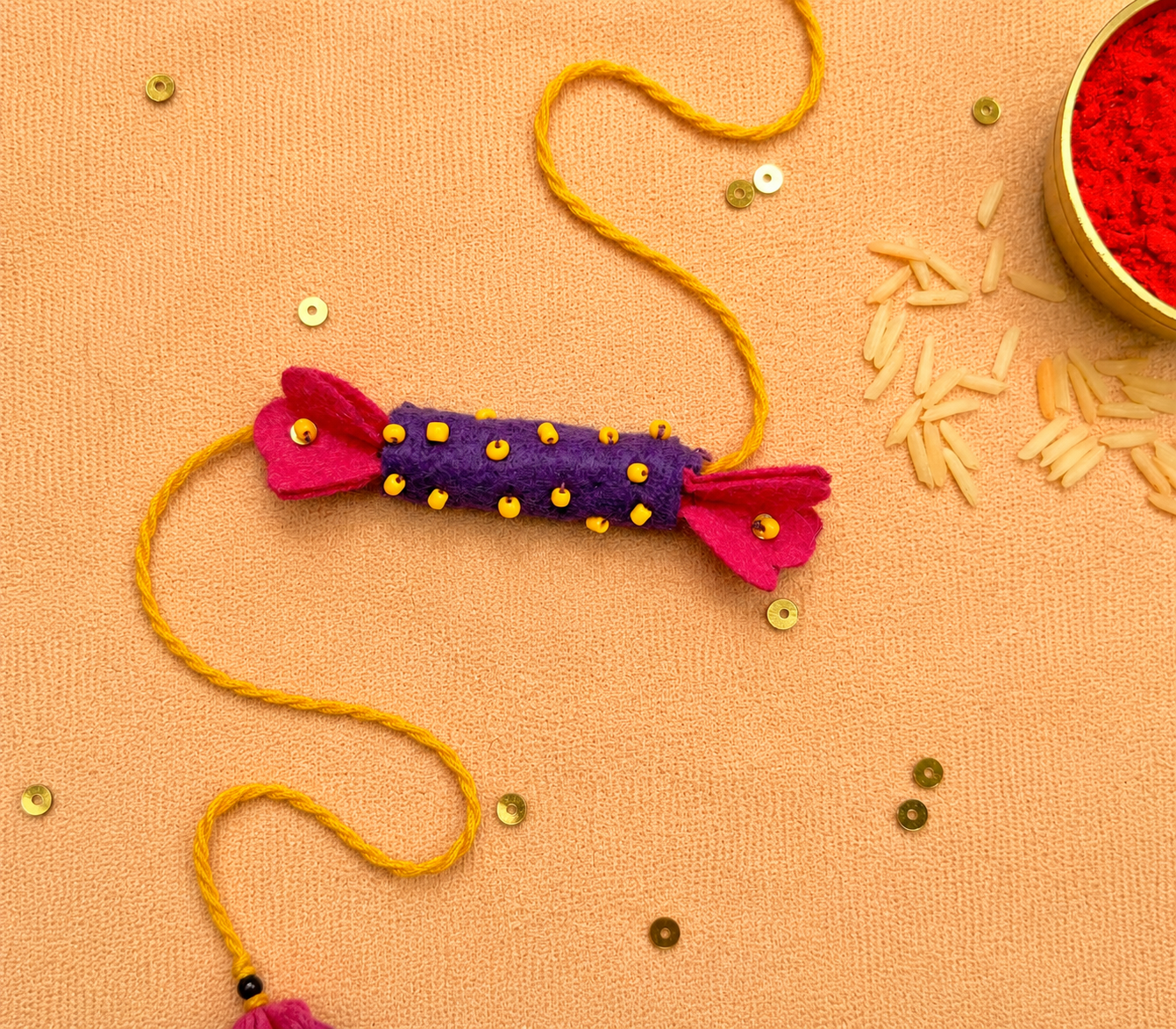 Hand embroidered Candy Rakhi-Purple