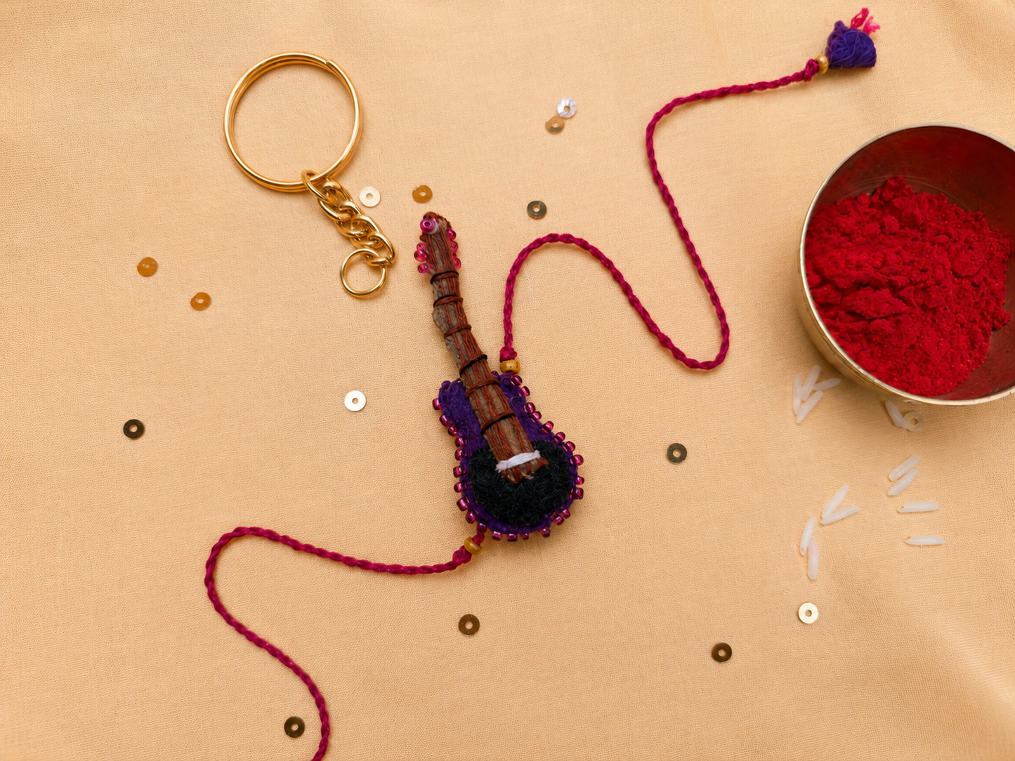 Hand embroidered Guitar Rakhi-Purple
