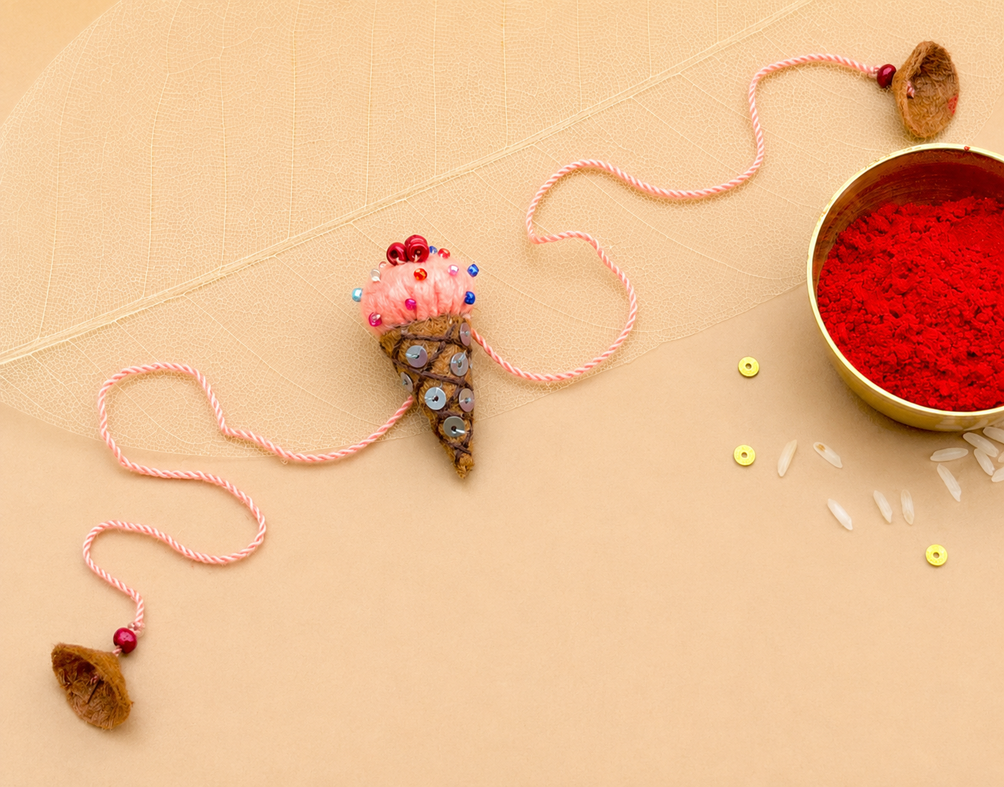 Hand embroidered Ice-Cream Rakhi-Peach