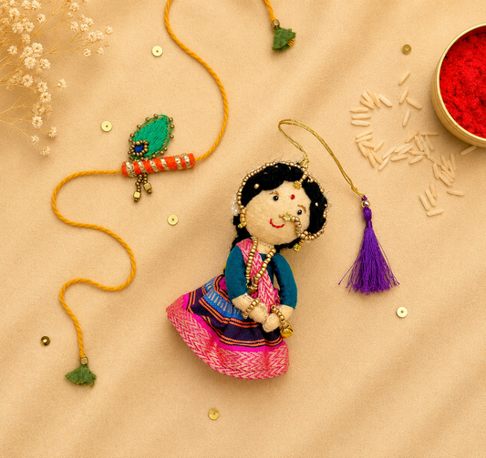 Radha Bansuri Rakhi Lumba Set (Set of 2)- Pink-Orange