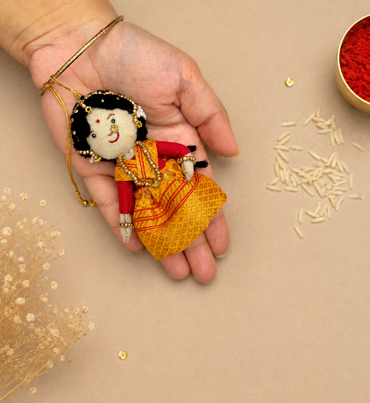 Radha Bansuri Rakhi Lumba Set (Set of 2)- Yellow-Orange