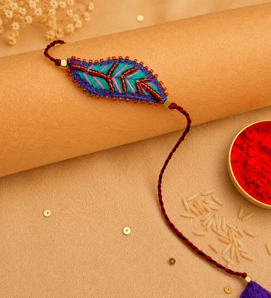 Hand embroidered Leaf Ornamental Rakhi (Sea Green-Pink)