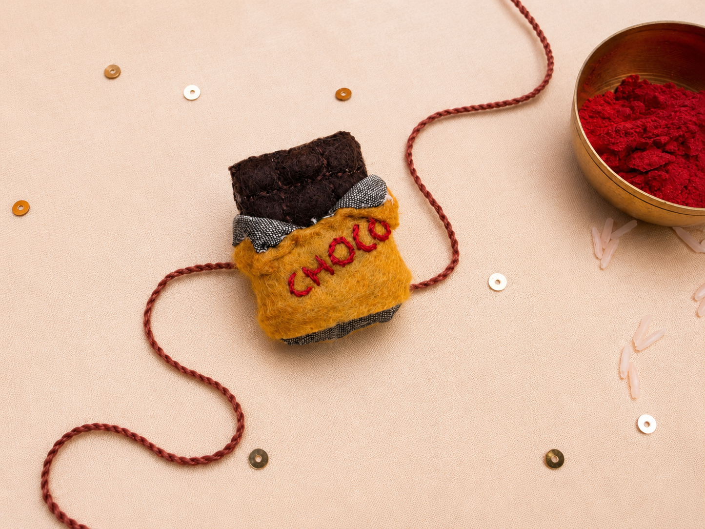 Hand embroidered Chocolate Rakhi- Yellow