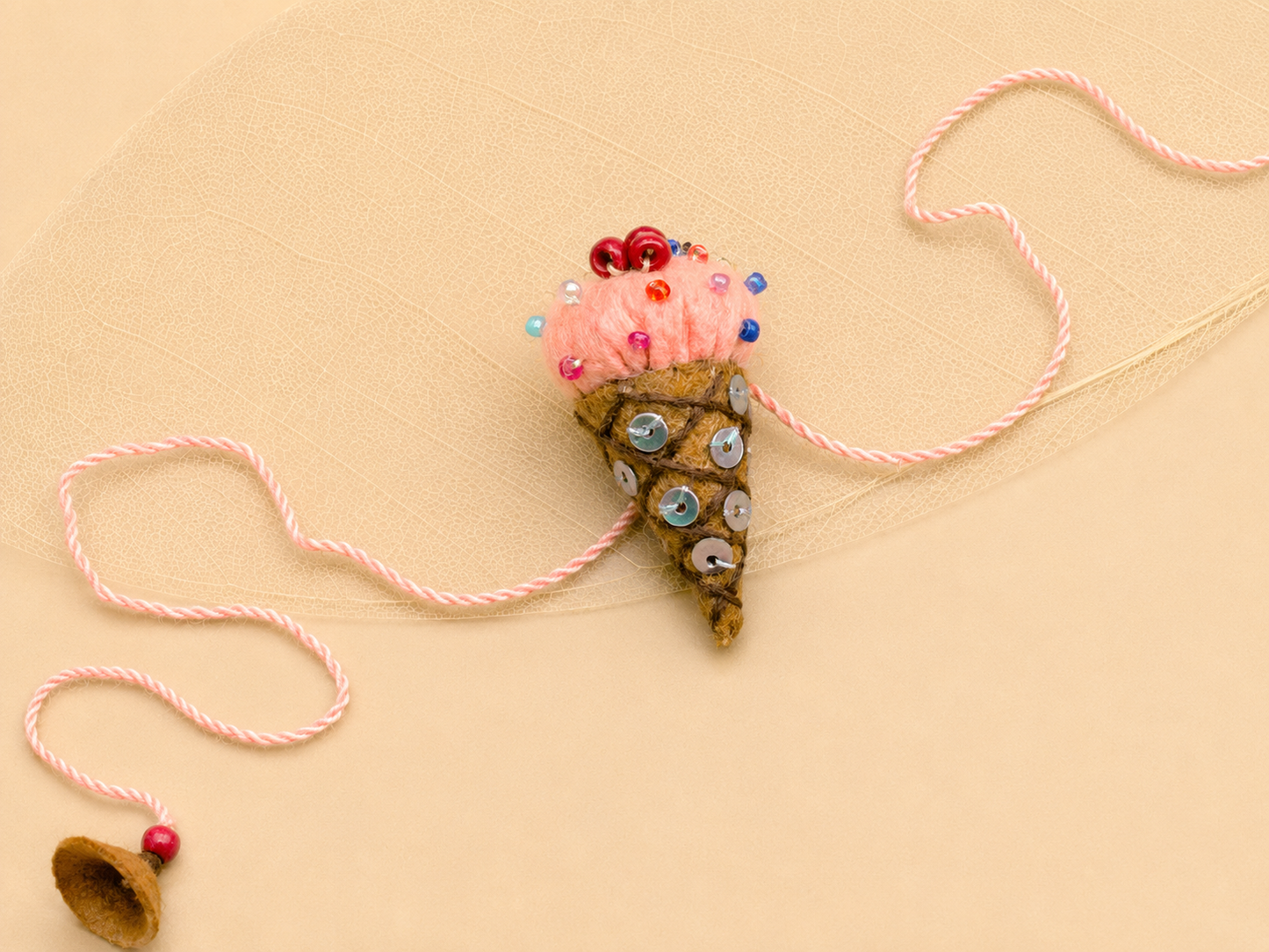 Hand embroidered Ice-Cream Rakhi-Peach