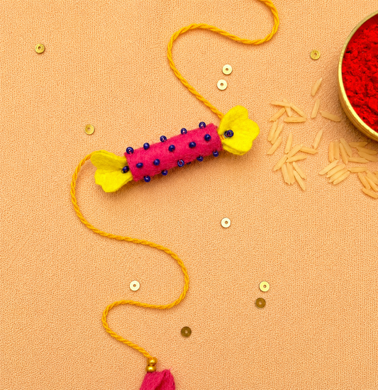 Hand embroidered Candy Rakhi-Pink