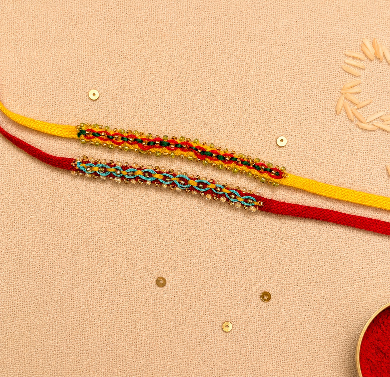Hand embroidered Double Leheriya Rakhi (Set of 2)- Blue-Pink