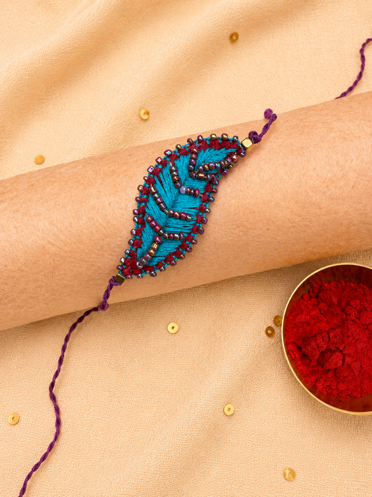 Hand embroidered Leaf Ornamental Rakhi (Turquoise)
