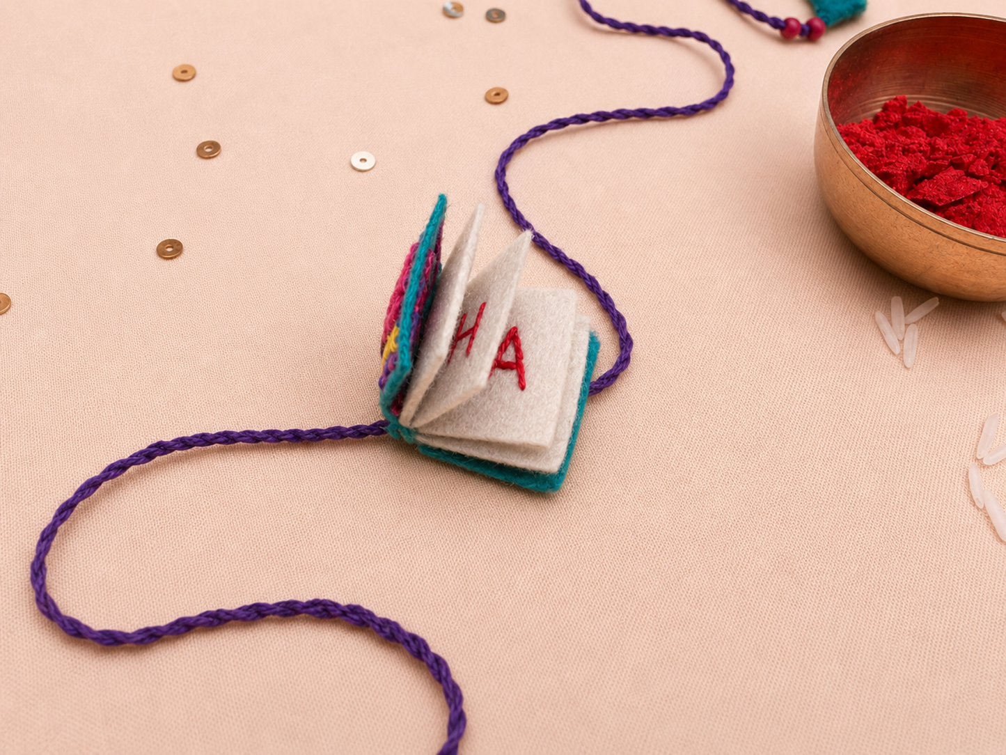 Hand embroidered Book Rakhi-Sea Green