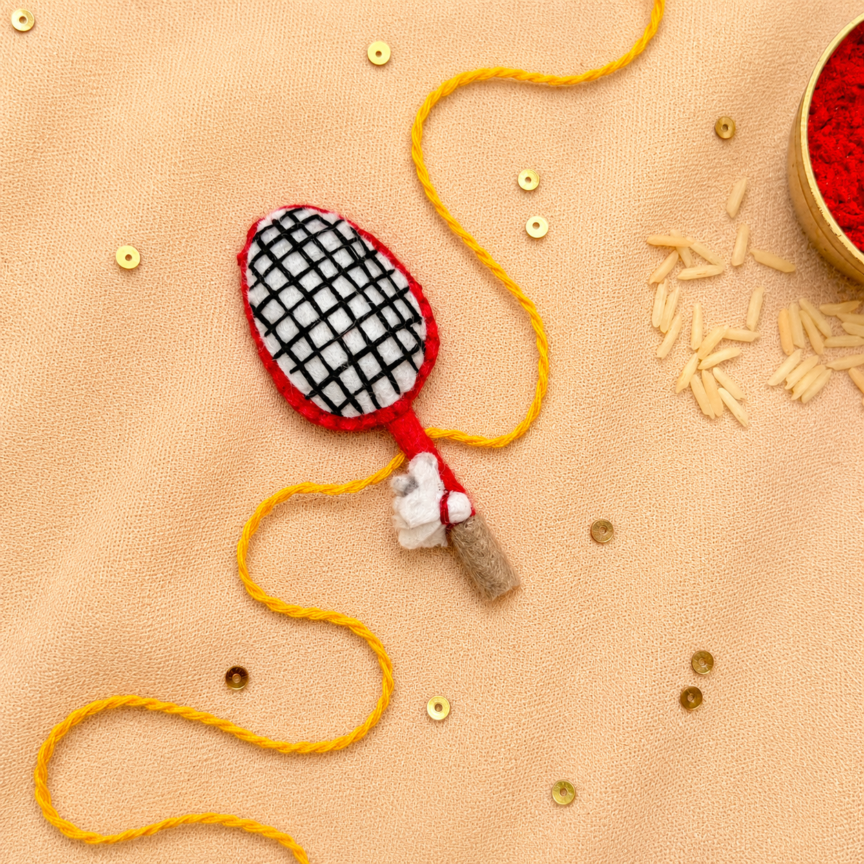 Hand embroidered Badminton Rakhi-Red