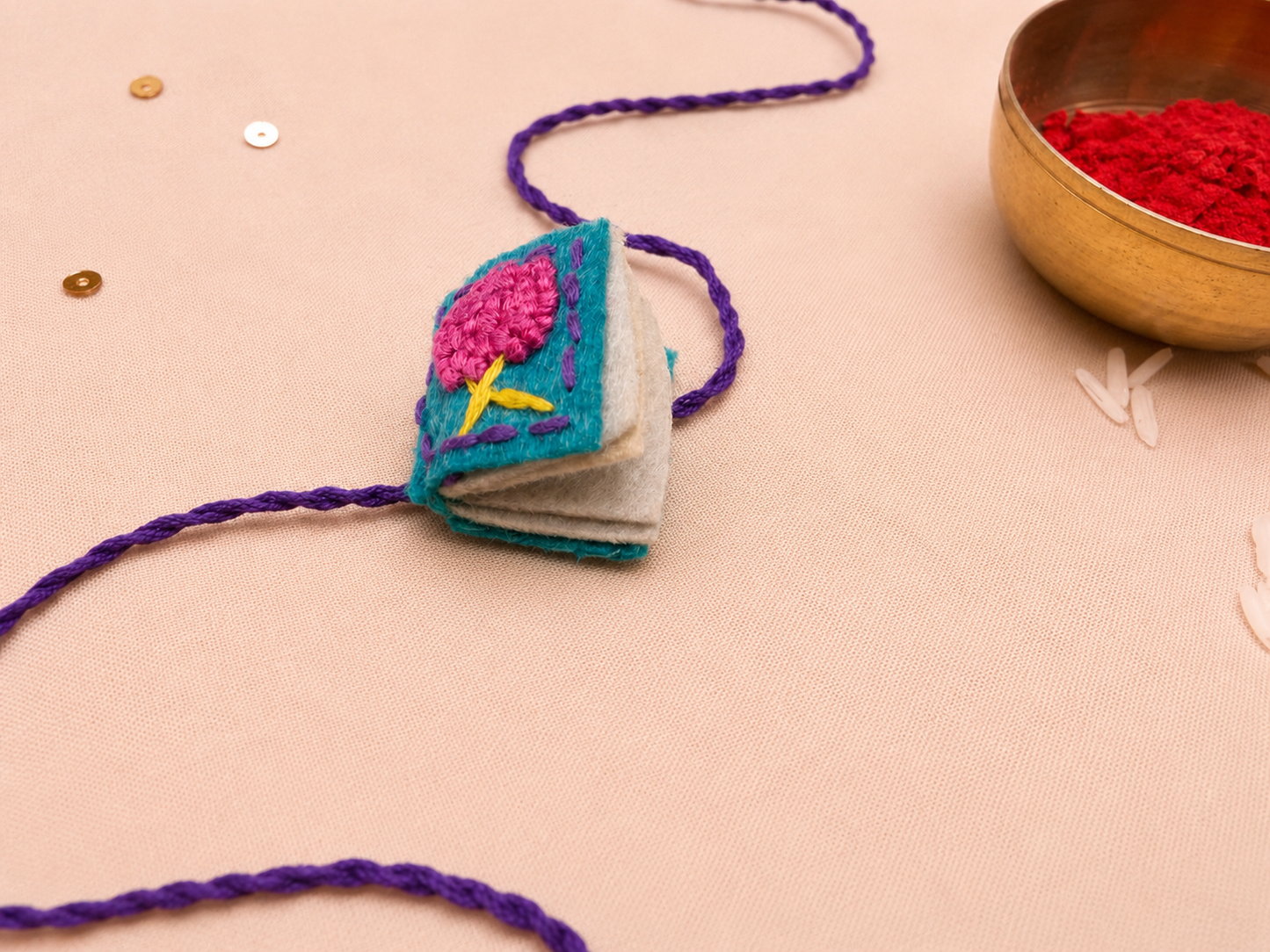 Hand embroidered Book Rakhi-Sea Green