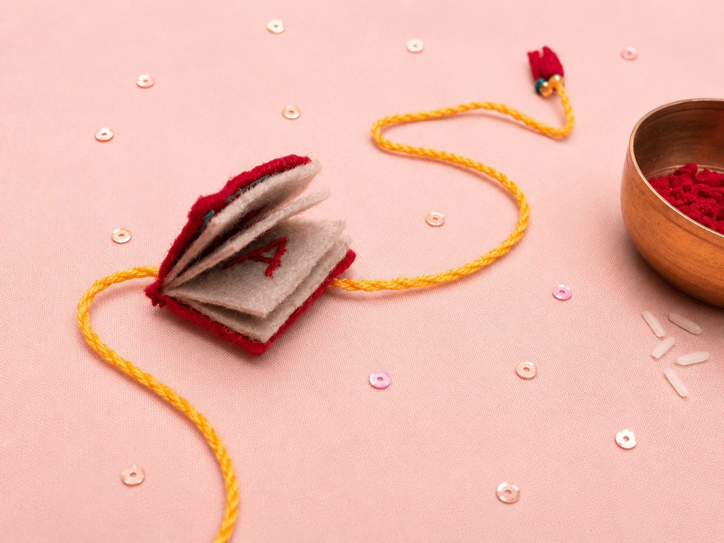 Hand embroidered Book Rakhi-Red
