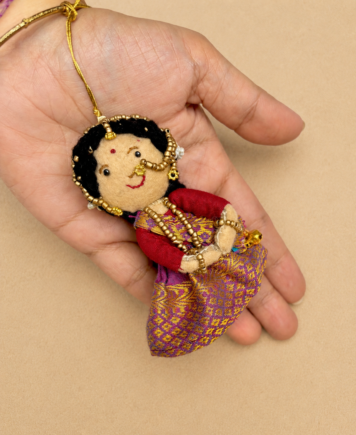Radha Bansuri Rakhi Lumba Set (Set of 2)- Purple-Orange