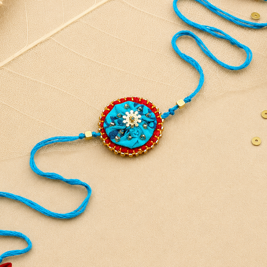 Hand embroidered Ragini Rakhi-Turquoise Print