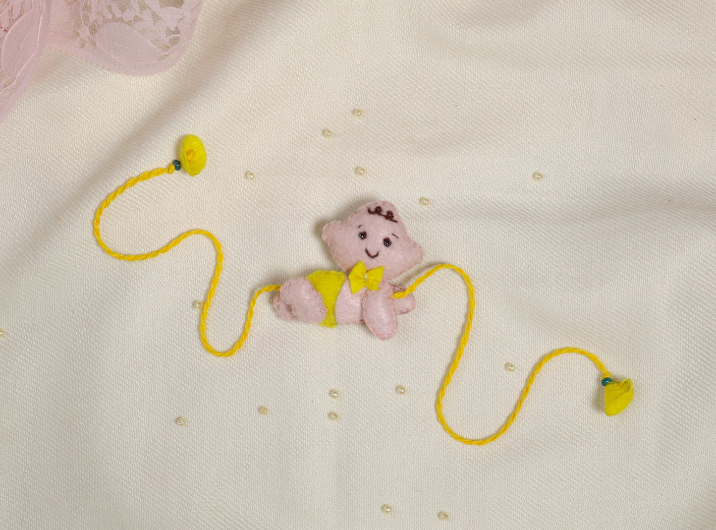 Hand embroidered Crawling Baby Rakhi-Yellow