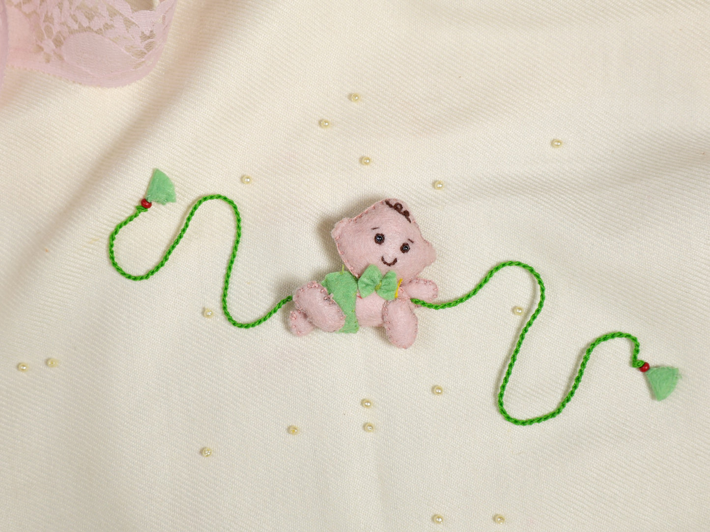 Hand embroidered Crawling Baby Rakhi-Pista Green
