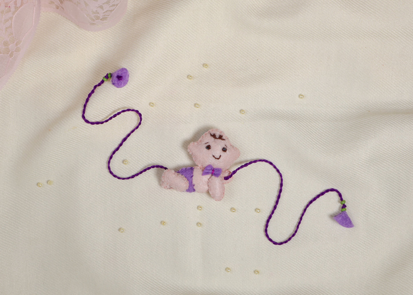 Hand embroidered Crawling Baby Rakhi-Purple