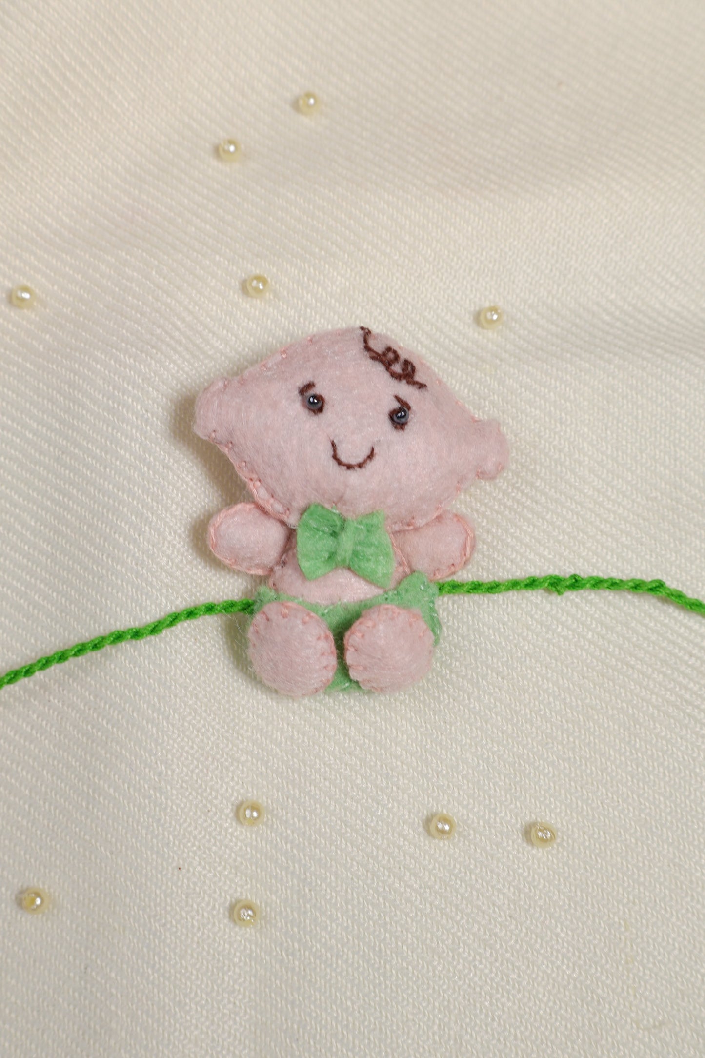 Hand embroidered Adorable Baby Rakhi-Pista Green