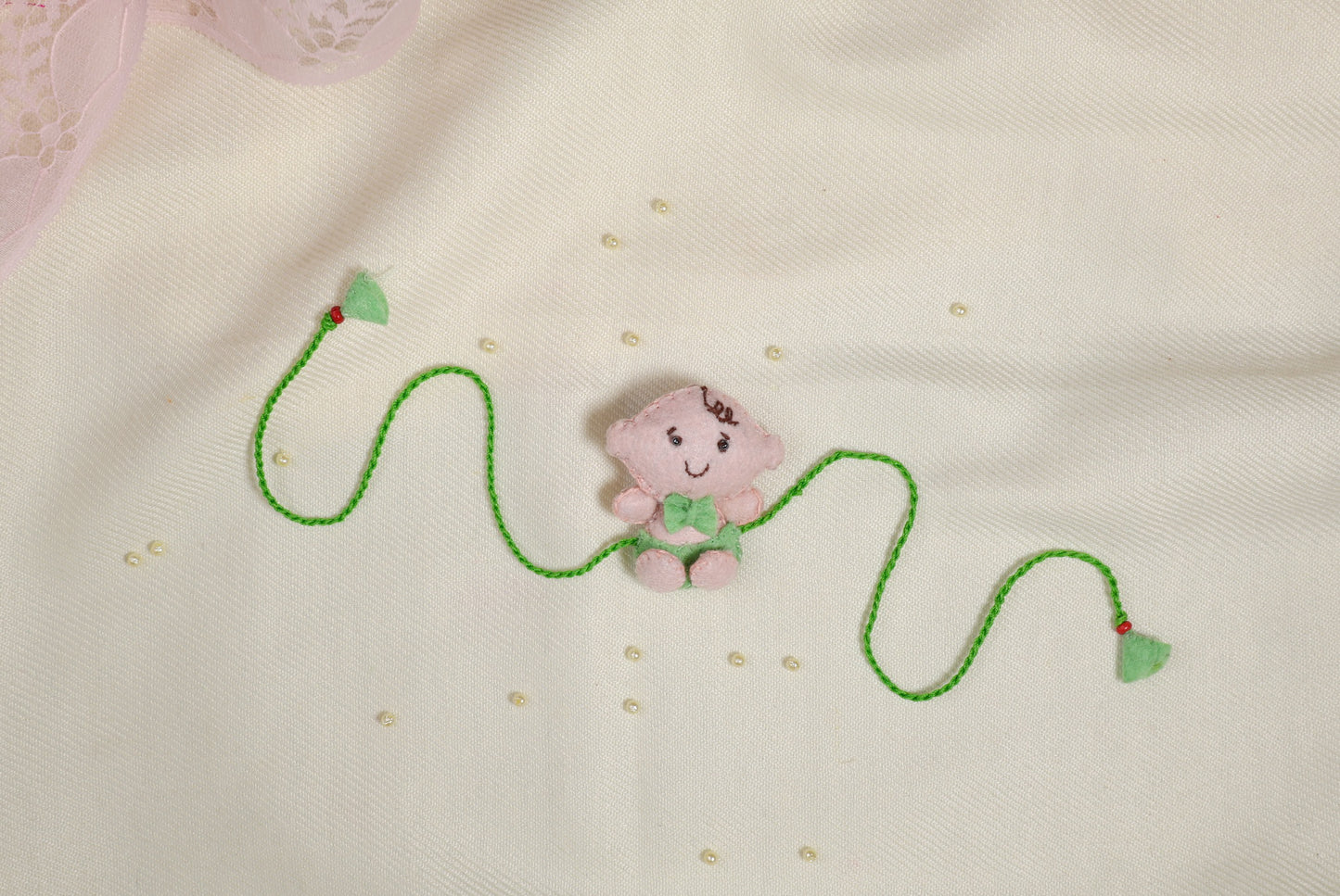 Hand embroidered Adorable Baby Rakhi-Pista Green