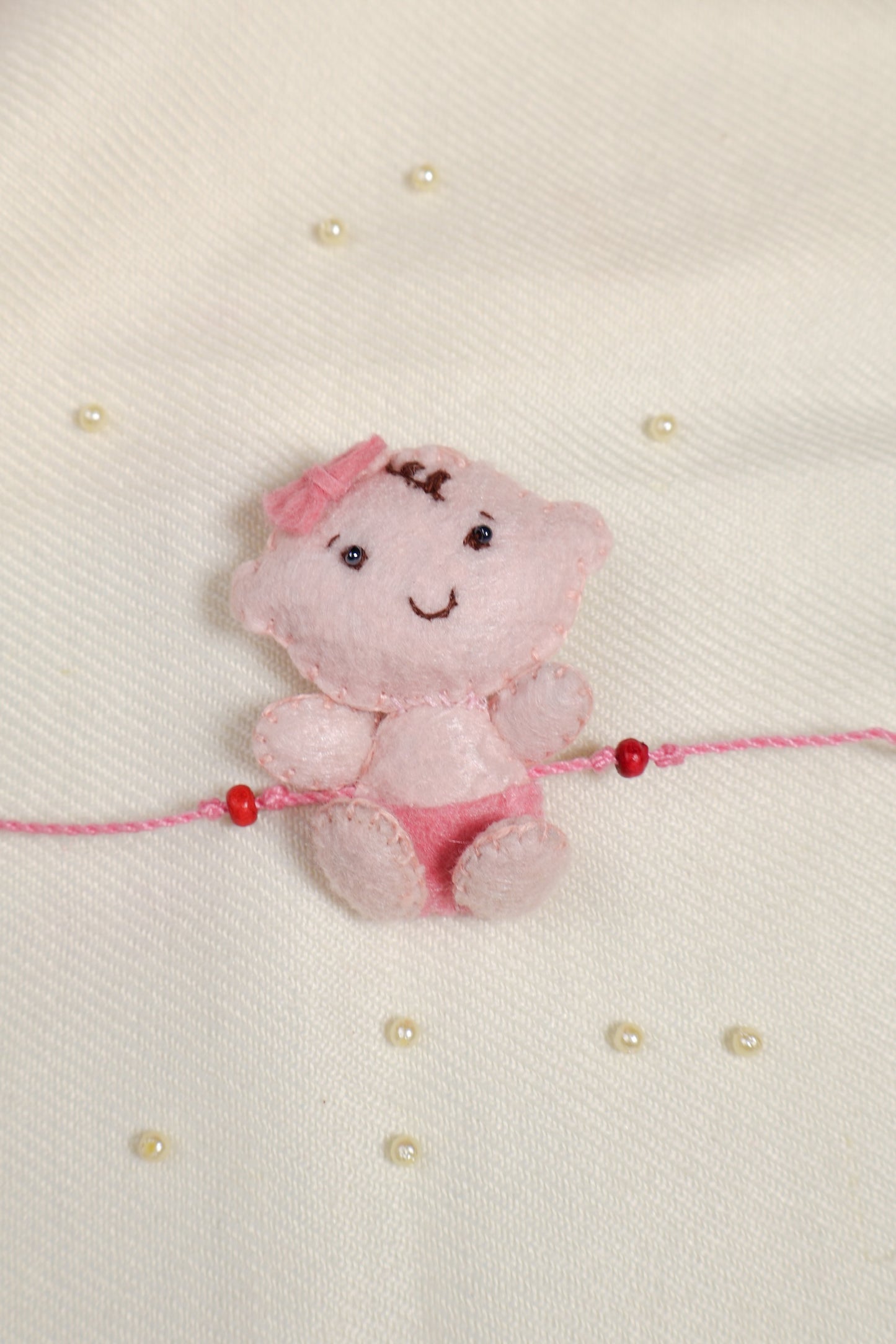 Hand embroidered Adorable Baby Rakhi-Pink