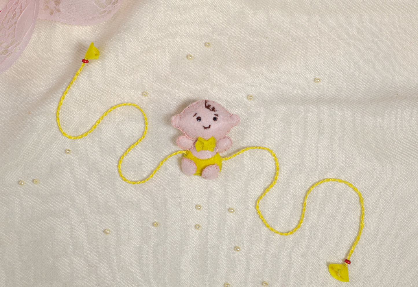 Hand embroidered Adorable Baby Rakhi-Yellow