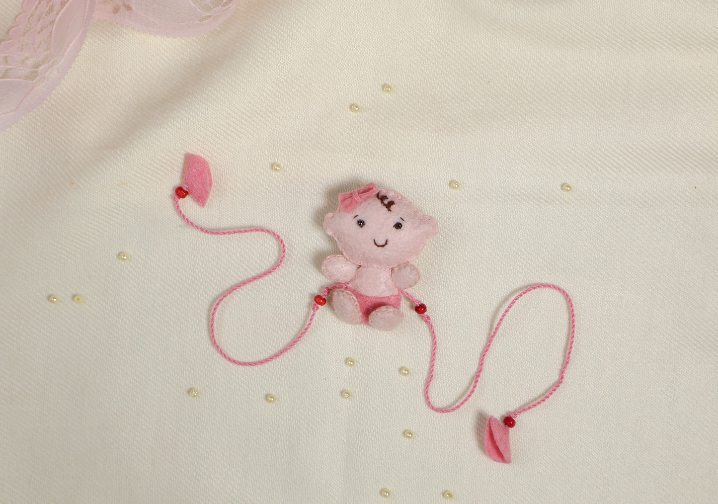 Hand embroidered Adorable Baby Rakhi-Pink