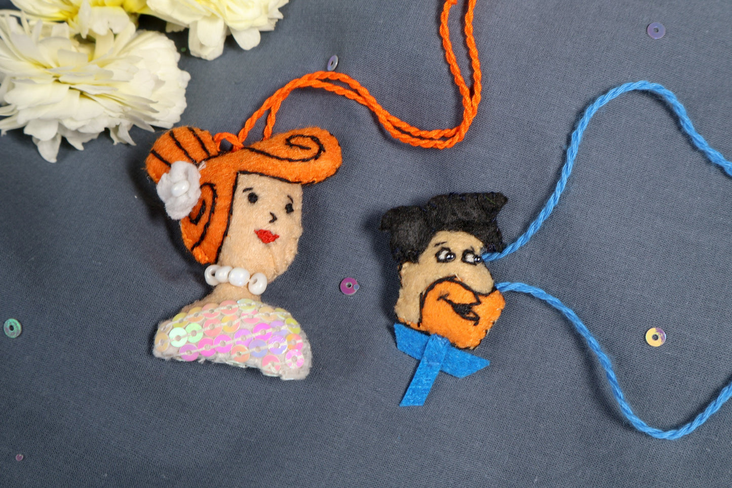 Hand embroidered Fred and Wilma Rakhi Lumba (Set of 2)