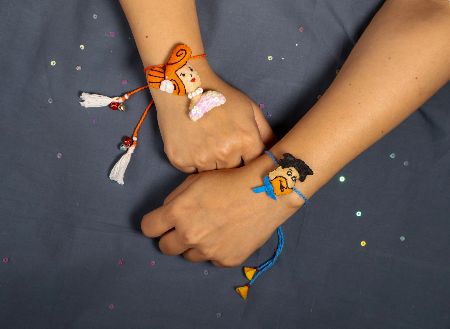 Hand embroidered Fred and Wilma Rakhi Lumba (Set of 2)