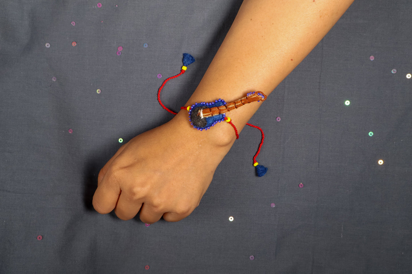 Hand embroidered Guitar Rakhi-Blue