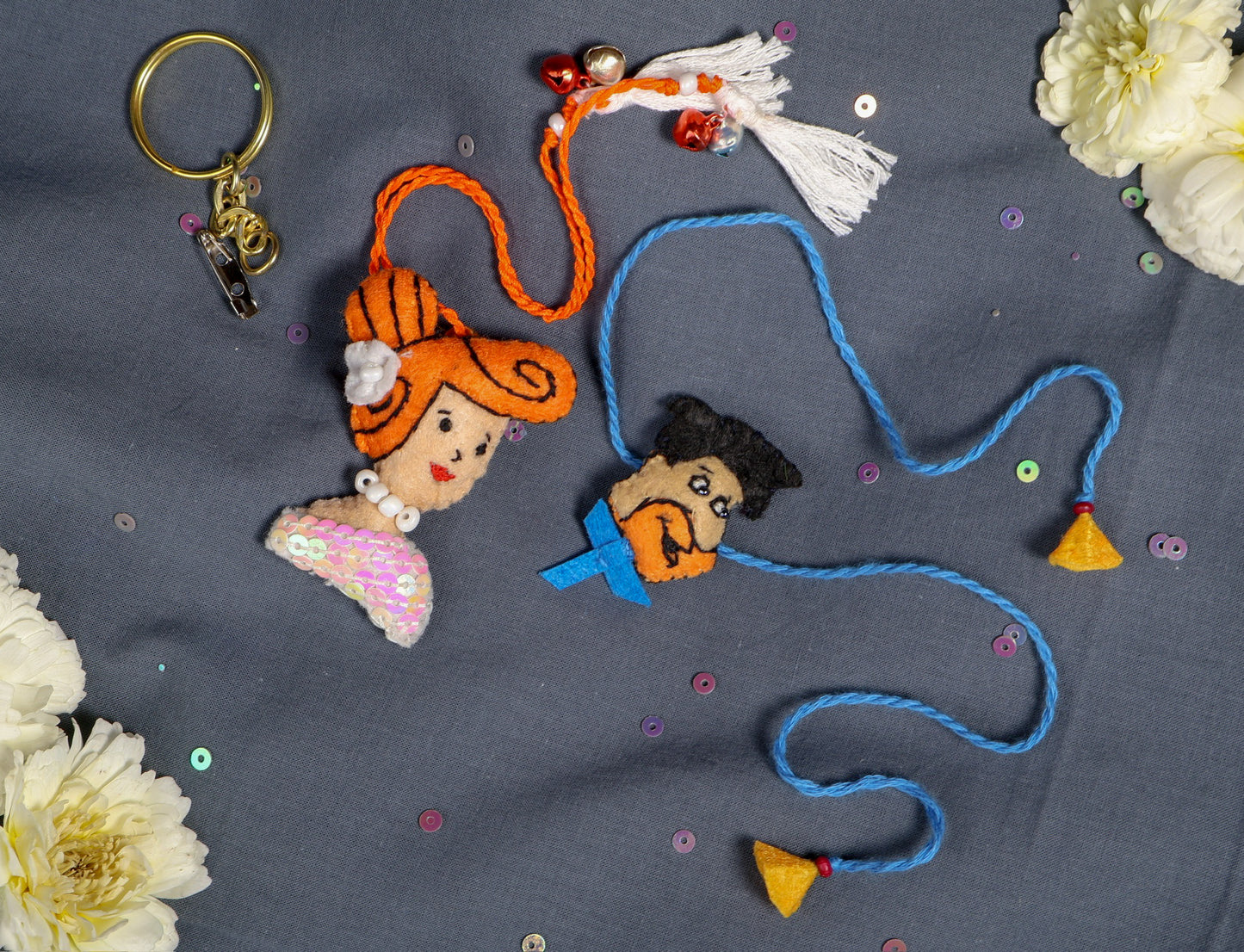 Hand embroidered Fred and Wilma Rakhi Lumba (Set of 2)
