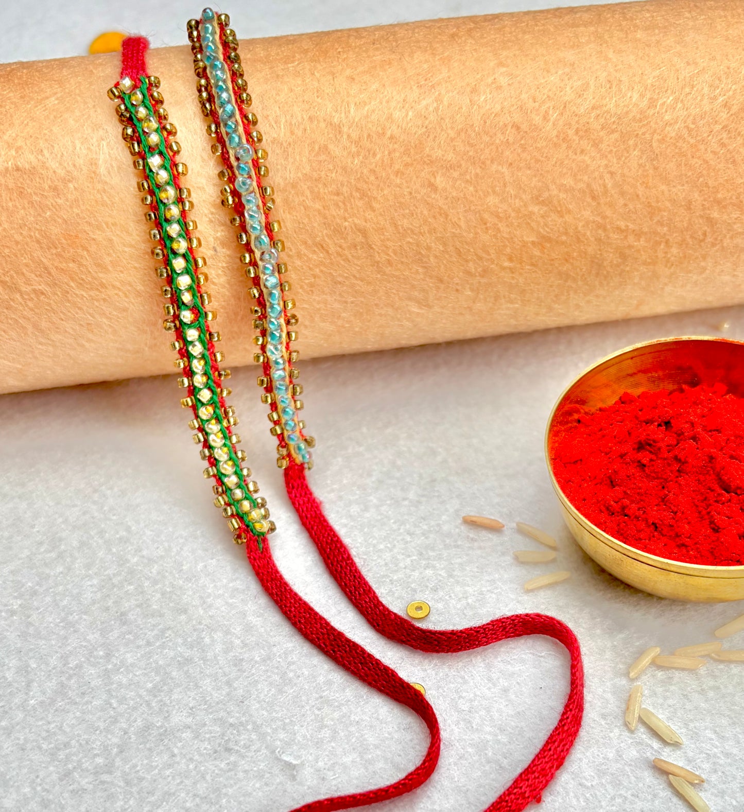 Hand embroidered Beaded Chain Rakhi (Set of 2)- Green-Beige