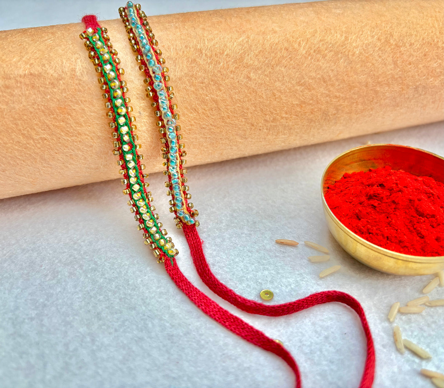 Hand embroidered Beaded Chain Rakhi (Set of 2)- Green-Beige