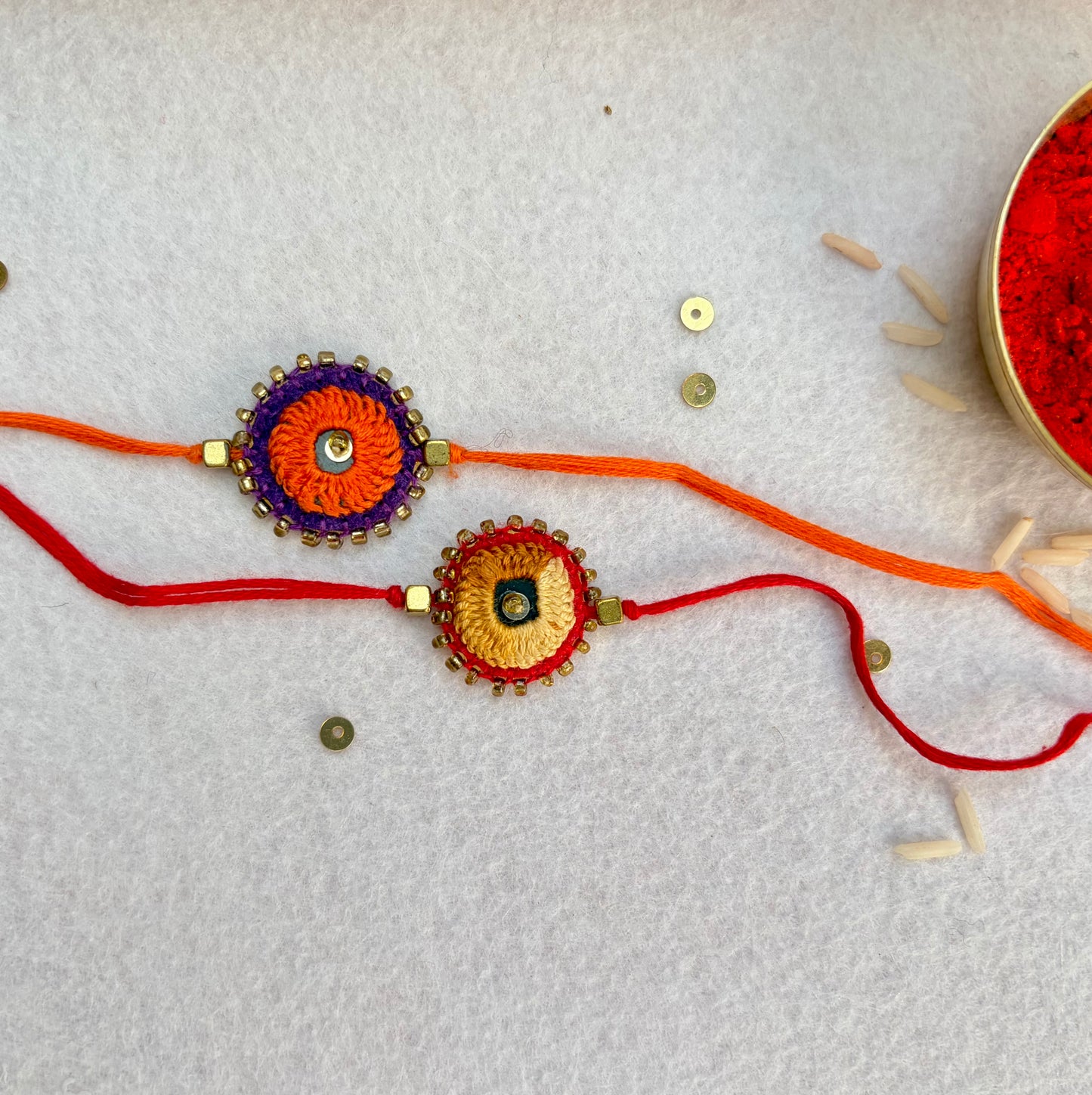 Hand embroidered Sheesha Rakhi (Set of 2) Beige-Orange