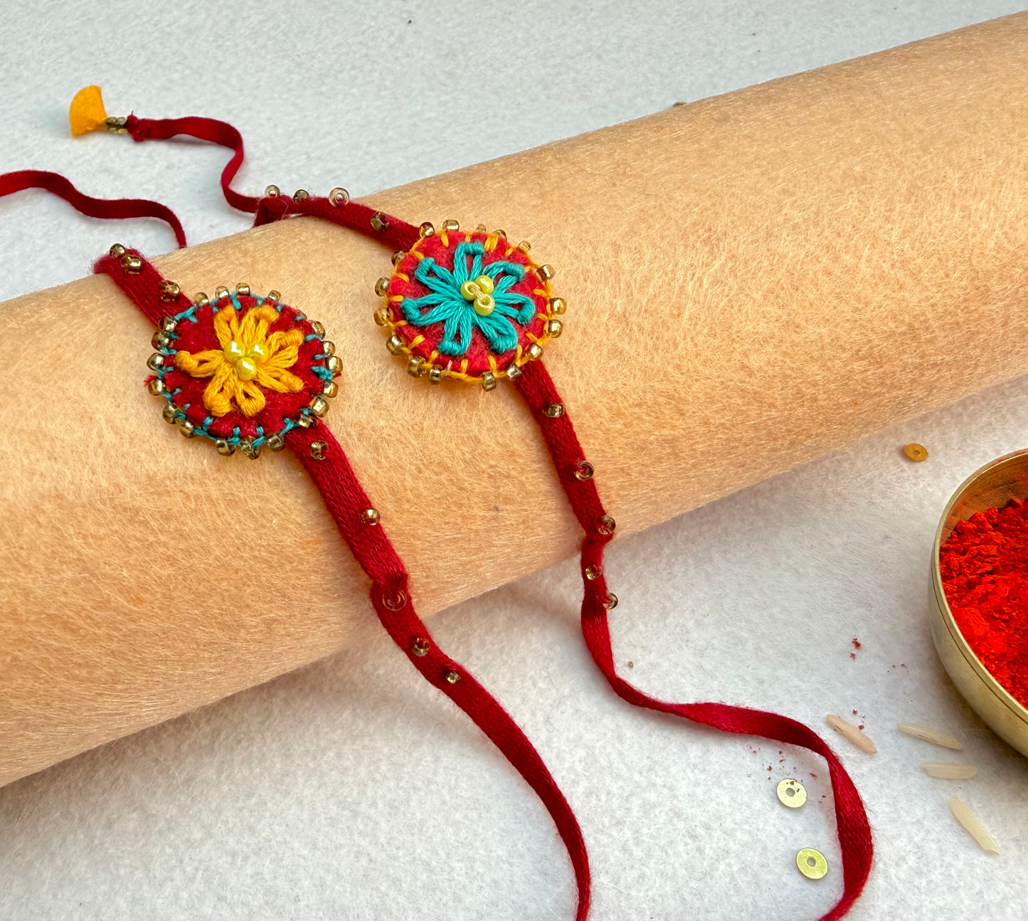 Hand embroidered Flower daisy Rakhi (Set of 2) Yellow-Blue