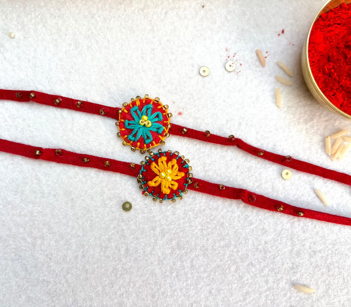 Hand embroidered Flower daisy Rakhi (Set of 2) Yellow-Blue