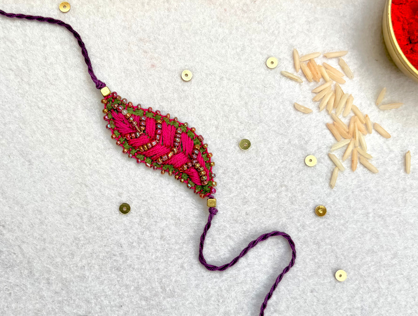 Hand embroidered Leaf Ornamental Rakhi (Pink)