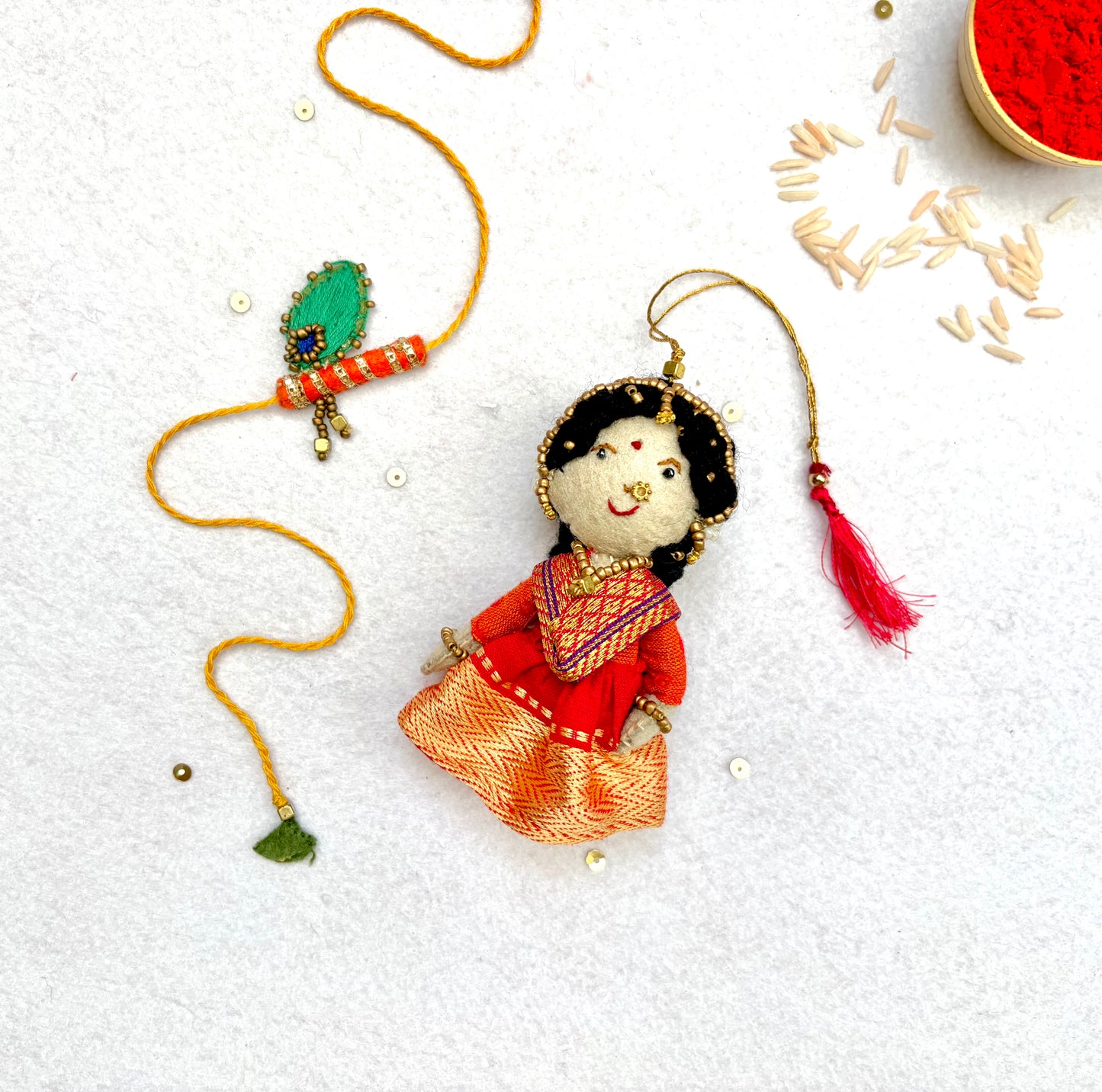 Radha Bansuri Rakhi Lumba Set (Set of 2)-Red-Orange