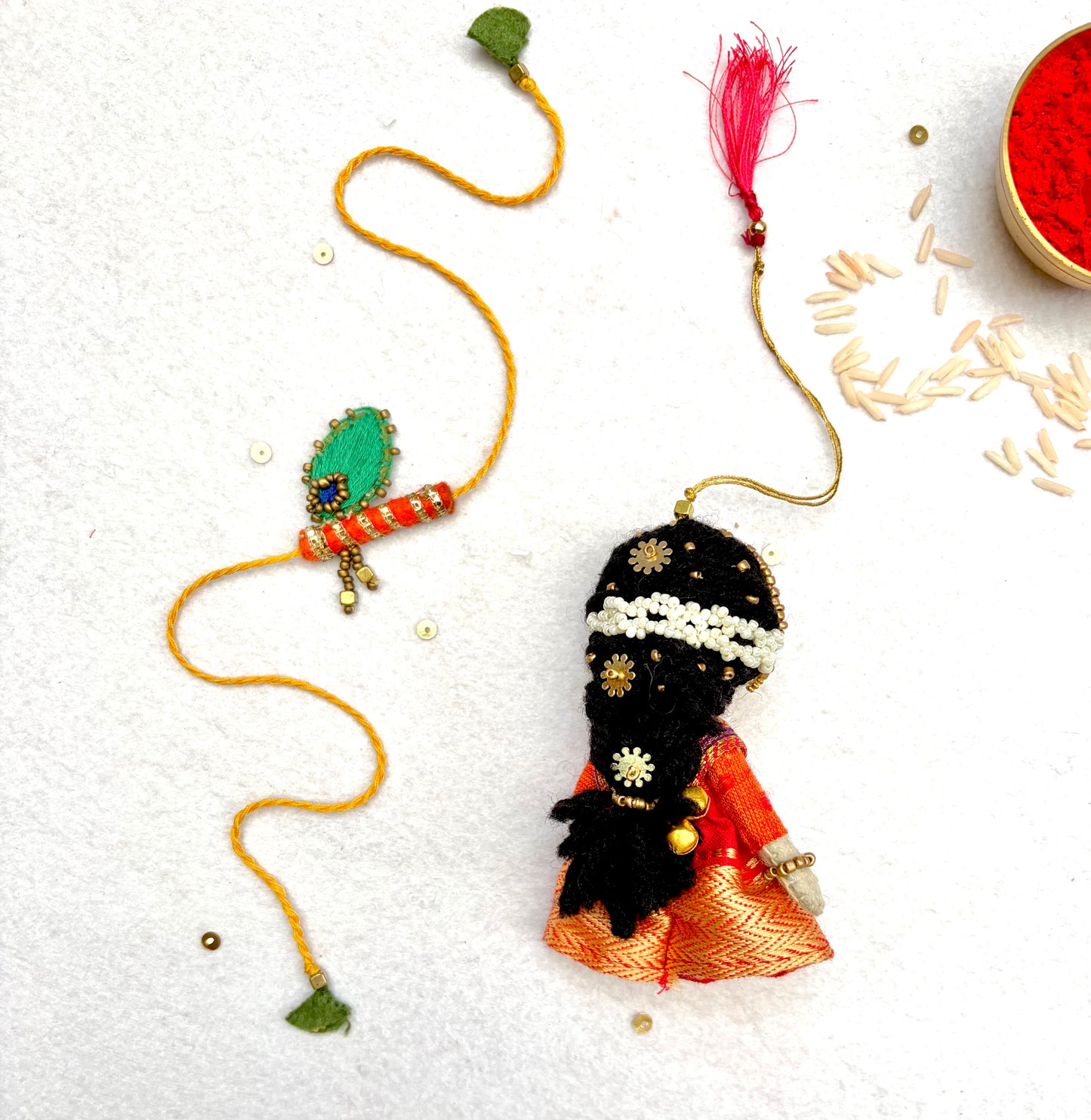 Radha Bansuri Rakhi Lumba Set (Set of 2)-Red-Orange